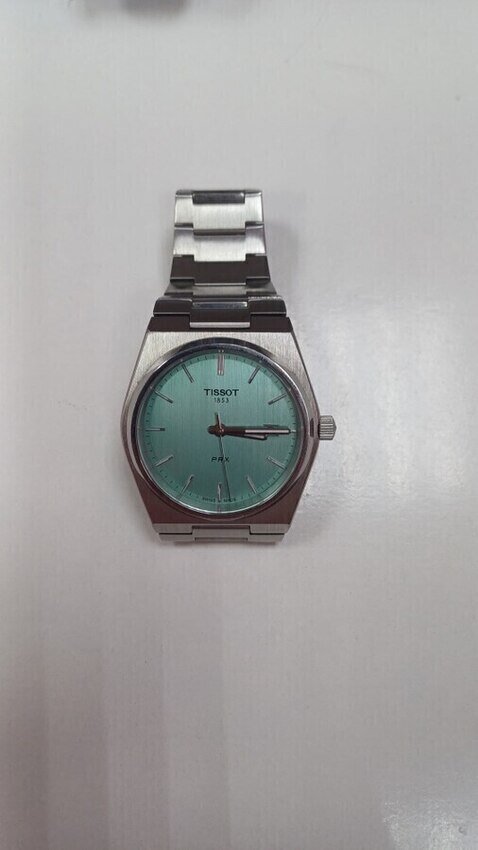 Часы tissot prx